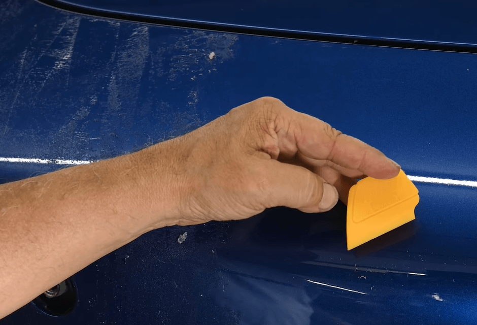 wd40 to remove adhesive from car